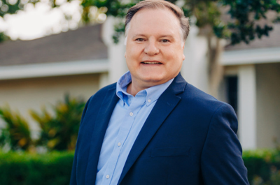 headshot of administrative assistant Damon Carroll